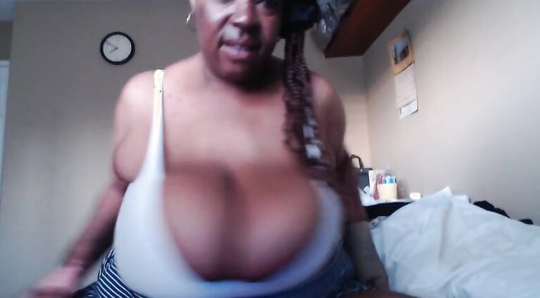 Tit fucking the dildo.