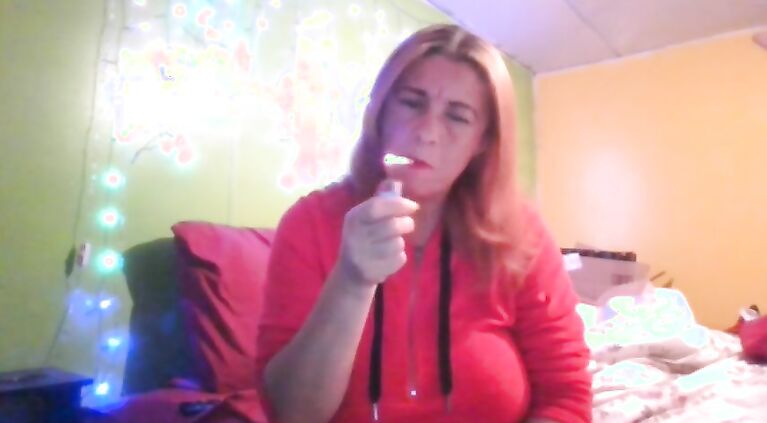 smoking in the bedroom and teasing my nipples and tit